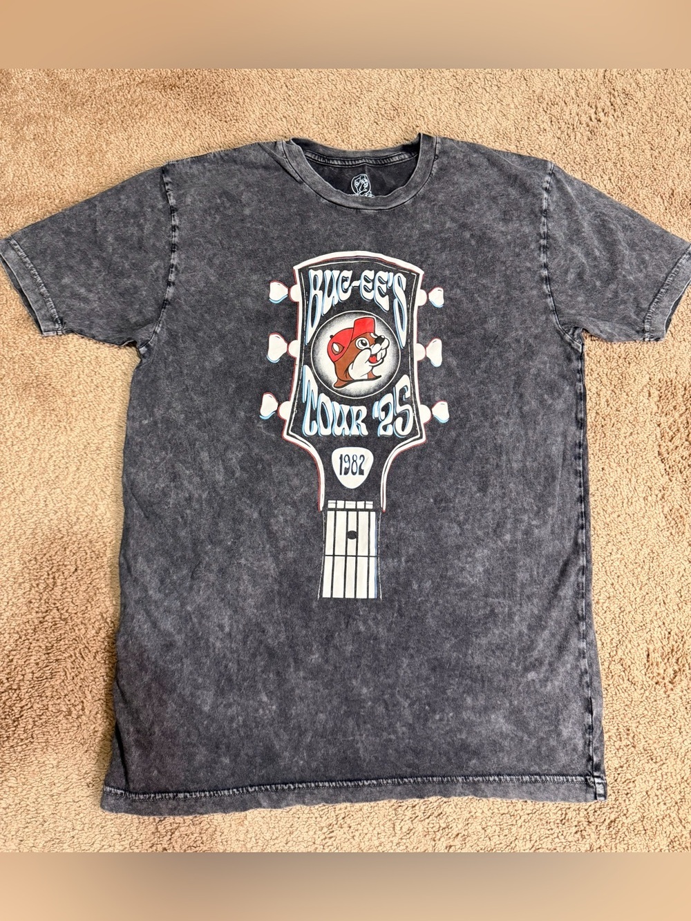 Men’s Buc-ee’s Black Graphic Short Sleeve Tee with Guitar Headstock Print